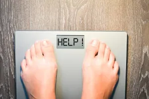 Ilustrasi Menimbang Berat Badan